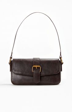 John Galt Brown Buckle Shoulder Bag | PacSun Luxury Vintage Shoulder Bag, Trendy Coach Shoulder Bag, Ruby Lyn Coach Bag, Vintage Brown Bag, Travel Essentials List, Buckle Bags, Long Flights, Essentials List, Brown Shoulder Bag