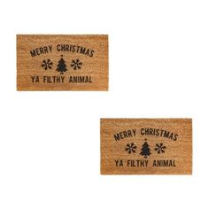 two christmas door mats with merry animals and snowflakes on the front, one in black