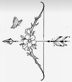 an arrow with flowers and butterflies on it