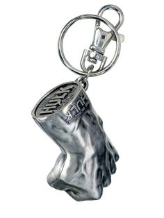 a metal keychain with a silver head on it