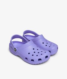 The Classic Clog K  item   by  Crocs  which is part of the FA2022  campaign , has arrived || is now available at . Purple Crocs, Crocs Classic Clogs, A A, Clogs, Purple, Color