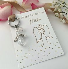 A beautiful handmade beaded sparkly crystal Angel charm on a silver stainless steel keychain, a perfect personalised  meaningful, birthday, thank you or any occasion gift for a Mother.  Option to choose a real crystal healing protection charm which will be wire wrapped by hand and added to the keychain. Choose from the drop down menu from  Rose Quartz -  Trust , Love , Healing Amethyst -  Protection,  Clarity,  Calmness  Green Aventurine -  Strength,  Confidence,  Courage Carnelian -  Confidence Personalized Silver Keychain For Personal Use, Personalized Silver Keychain, Personalized Silver Keychain Gift, Silver Keychain With Lobster Clasp For Gift, Silver Keychain With Lobster Clasp As Gift, Handmade Silver Keychain For Gift, Silver Keychain With Lobster Clasp, Handmade Silver Keychains For Gifts, Handmade Silver Keychain As Gift