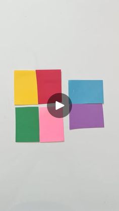 the video shows how to make colored paper squares