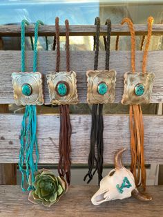 Leather braided necklace with gorgeous statement bolo concho with faux turquoise center stone. Measures: 35" Concho: 2.75" x 3.25" Critter Sitters, Nfr Style, Authentic Turquoise Jewelry, Steer Head, Bolo Necklace, Buckle Necklace, The Outlaw, Clay Work, Braided Necklace