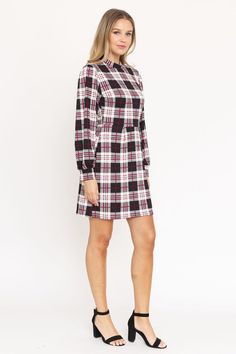 High Neck Plaid Sheath DressLooking for a versatile and stylish dress that can take you from the office to a date night? Look no further than our High Neck Plaid Sheath Dress! This flattering dress is made from a polyester-spandex blend, so it's both comfortable and figure-hugging. The high neckline and plaid print give it a touch of sophistication, while the shorter hemline keeps it fun and flirty. Pair it with heels and a blazer for a polished work look, or dress it down with flats and a denim Burgundy Outfit, High Neck Mini Dress, High Neck Designs, Black Sheath Dress, Bishop Sleeve, Flattering Dresses, Brown Plaid, Work Looks, Plus Size Dress