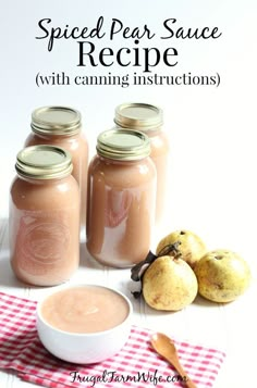 three jars filled with peanut butter sitting on top of a red and white checkered table cloth