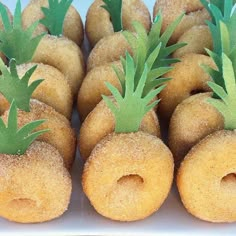 several donuts with pineapples on them are arranged in the shape of doughnut holes