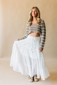 Channel your inner free spirit with our Sunchild Knit Crop Top! This playful top brings boho vibes to your wardrobe with a 70's inspired knit design in deep summer colors. Perfect for adding a touch of fun to any outfit. White Tiered Skirt Outfit, Tiered Skirt Outfit, Deep Summer, White Long Skirt, Tiered Maxi Skirt, Small Crop Tops, The Swing, White Skirt, Midi Maxi Dress