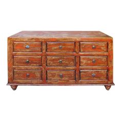 an old wooden dresser with many drawers