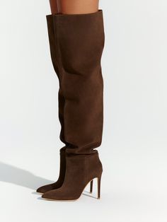 The ultimate statement boot with two-in-one versatility. Crafted from premium Italian leather and a suede finish, with a pointed toe, and stiletto heels. Available in black, chocolate brown, and dark grey tones. Wear them tall or create a slouchy look. Boots Collection Italian leather sole & inner-top-lining Imported Suede Stiletto heel Heel height: 4" True to size. Full sizes only - please size up if needed. Model is wearing size 38 Please note: Returns for shoes are accepted up to 15 days afte Over The Kneww Boots, Size 12 Shoes For Women, Tall Fall Boots, Heel Aesthetic, Suede Thigh High Boots, Thigh High Stiletto Boots, Brown Heeled Boots, Dark Brown Boots, Heels Aesthetic