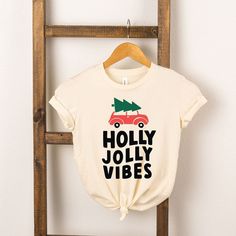 Looking for a cute tee for your kids? We have the perfect Holly Jolly Vibes Car graphic tee addition to their closet! Car Graphic Tee, Holly Jolly Vibes, Toddler Graphic Tee, Happy Labor Day, Toddler Christmas, Online Clothing Boutiques, Cool Graphic Tees, Fashion Inspiration Design, Toddler Tees