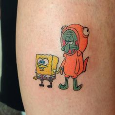 a person with a tattoo on their leg and an image of a spongebob