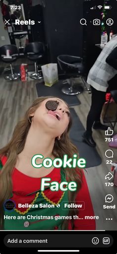 a woman in a red shirt is singing into a microphone with the words cookie face on it