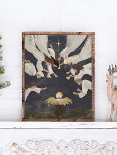 A Print of the nativity scene. Baby Jesus surrounded by angels and trumpets with a dark navy background Contemporary Nativity Painting, Simple Nativity Painting, Christian Christmas Art, Gospel Pictures, Nativity Wall Art, Nativity Christmas Decor, Nativity Scene Art, 2024 Celebration, Nativity Art