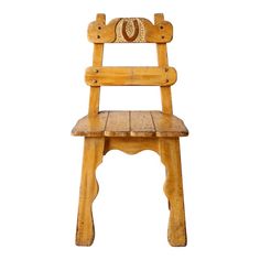 an old wooden chair that is sitting up against a white background with the seat down