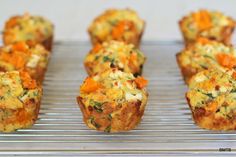 several muffins are sitting on a cooling rack