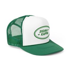 a green and white trucker hat with the word stigma kapa on it