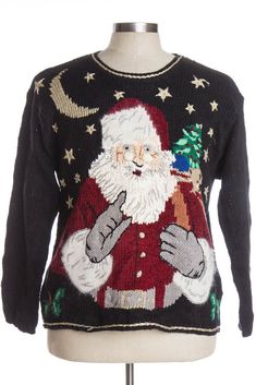 a black sweater with santa clause on it