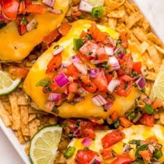 an enchilada dish with tortilla chips and salsa