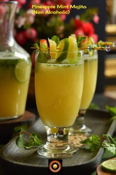 pineapple mint mojito non alcoholic recipe in two glasses with limes on the rim