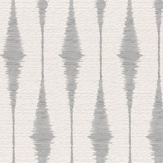 a white and grey striped wallpaper pattern