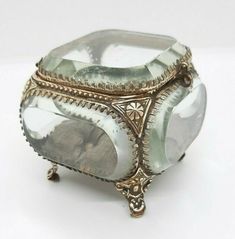 an antique silver and glass jewelry box