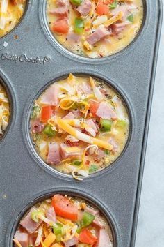 four muffin tins filled with different types of food in each cupcake pan