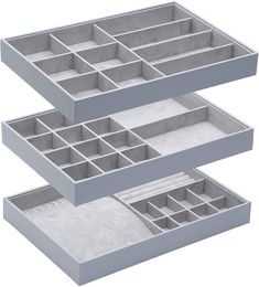 three gray trays with compartments on each side