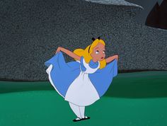 an animated image of alice dancing in the grass