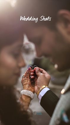 a man and woman holding each other's hands with the words wedding shots in front of them