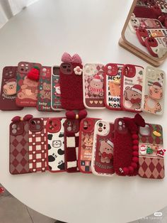 there are many cell phones that have been decorated with animals and teddy bears on them