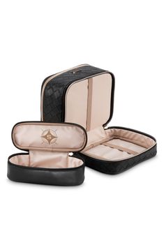 What it is: A spacious cosmetics case designed with top and bottom storage compartments perfect for organizing makeup and skin-care essentials. Exterior zip closures Interior zip and wall pockets; removable zip pouch Synthetic Imported Organizing Makeup, Cosmetic Train Case, Makeup Brush Case, Stephanie Johnson, Black Makeup, Train Case, Storage Compartments, Wall Pockets, Makeup Case