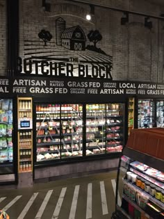 a grocery store filled with lots of food and vending machines next to each other