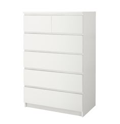 a white dresser with five drawers