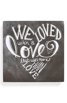 a chalkboard with the words we loved written on it