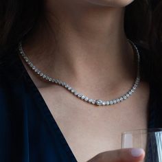 Our Celeste Tennis Necklace is epitome of classy and iconic. Dazlling enough on its own, but looks even more glamorous if you add on the matching Celeste Tennis Bracelet and earrings for a red-carpet ready look. This necklace guarantees an unforgetttable impression. - Rhodium Plating over Brass- Cubic Zirconia- Length approximately 16.5"- Available in White Gold only Tennis Necklace Outfit, Necklace Outfit, Cultured Pearl Necklace, Gold Statement Necklace, Puffed Heart, Bow Jewelry, Tennis Necklace, Birthstone Pendant, Statement Bracelet