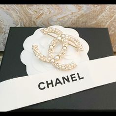 Gorgeous Authentic Chanel Large Cc Gold Pearl Brooch. From The Continuous 2016 Collection By Karl Lagerfeld. Featuring Gold Plated Metal With Adorned With Pearls. Pin Closure. Measurements: Length 1.4", Width 1.9". Excellent Condition. Includes Box. Classic White Brooches For Evening, Classic White Evening Brooches, Chic White Formal Brooch, Luxury White Brooch For Gift, Luxury White Brooches As Gift, Luxury White Brooches For Gifts, Designer White Brooches For Formal Occasions, Designer White Brooches For Wedding, Designer White Wedding Brooches