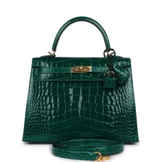 This Kelly 25, in the Sellier style, is in Emerald shiny Mississippiensis alligator with gold hardware and has tonal stitching, front flap, two straps with center toggle closure, clochette with lock and two keys, single rolled handle and removable strap.The interior is lined with Emerald chevre and has a zip pocket with an Hermes engraved zipper pull and two open pockets on the opposite side. Collection: AOrigin: FranceCondition: Pre-owned; Excellent to Mint -This bag retains its shape structure. There's partial plastic on the hardware. Moderate scratching to the turnlock hardware. Some minor creasing to exterior leather and small water spots on front exterior leather. The interior leather is clean with no signs of wear.Accompanied by: Hermes box, Hermes dustbag, clochette, lock, two keys, Kelly 25 Sellier, Hermes Kelly Sellier, Hermes Kelly 25, Kelly 25, Alligator Handbags, Kelly Sellier, Hermes Kelly Bag, Hermes Birkin 25, Design Bag