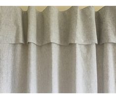 a curtain with ruffles hanging from it