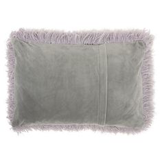 a gray pillow with purple fringe trim and a white back ground, on a white background