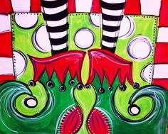 a painting with green and red designs on it's face, surrounded by white and black stripes