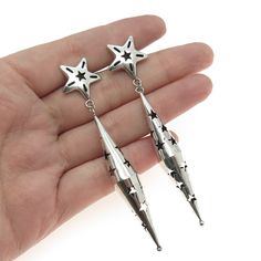 Great vintage condition.  925 Sterling Silver Vintage Modernist Shadow Box Star Dangle Earrings  Weight: 10.9g   WELCOME TO PAWN SHOP We are an actual pawn shop and have been in business for over 25 years. Since 1990, our establishment has been serving a variety of clients by providing them with short term cash solutions and options of liquidity regarding their treasured heirlooms. Acknowledging that today′s customers are very sophisticated and are looking for a variety of investments, our acqui Star Dangle Earrings, Pawn Shop, Shopping Ideas, Etsy Earrings Dangle, 25 Years, Shadow Box, Jewelry Earrings Dangle, Dangle Drop Earrings, Jewelry Watches