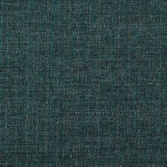 an upholstered fabric textured with dark blue and green colors, suitable for wallpaper or curtains