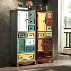 a multicolored cabinet with drawers in a room