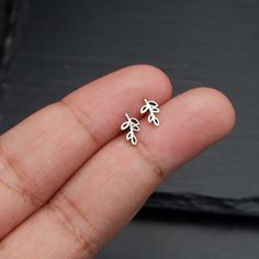 Real 925 Sterling Silver Tiny Leaf Vine Stud Earrings These lovely earrings can be used in Earlobe, Tragus and Cartilage. Measures 8.5 x 5 mm Comes with pushback backings Sold by Pair Jewelry will come in a gift box * Please read shop policy before placing an order * *JEWELRY CARE* Sterling Silver will tarnish over time, but to help keep your jewelry looking beautiful - Clean with a soft dry cloth after wear and store inside an airtight bag or container. Remember to remove your jewelry when: * A Simple Silver Stud Earrings, Dainty Tiny Sterling Silver Cartilage Earrings, Silver Sterling Cartilage Earrings Gift, Dainty Tiny Silver Cartilage Earrings, Silver Sterling Silver Cartilage Earrings Gift, Gift Silver Sterling Silver Cartilage Earrings, Delicate Nickel Free Silver Cartilage Earrings, Delicate Silver Nickel-free Cartilage Earrings, Delicate Nickel-free Silver Cartilage Earrings