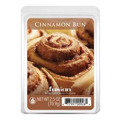 cinnamon buns in a plastic container on a white background with the label below it