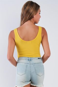 This Mustard Yellow Ribbed Tank Top Bodysuit is a must-have for any wardrobe. The ribbed design adds texture and a touch of style, while the snug fit allows for a flattering silhouette. Made of comfortable and durable fabric, it's perfect for all-day wear. Elevate your outfit with this versatile and chic bodysuit. 🖤 Complete the look: Pair with sandals and denim shorts a chic summer outfit. Add denim jacket and sneakers for a stylish, layered look. Dress it up with flat shoes and flare jeans fo Simple Blouses, Pool Party Wear, Tank Top Bodysuit, Chic Summer Outfits, Ribbed Tank Top, Ribbed Tank Tops, Ribbed Tank, Online Fashion Stores, Layered Look