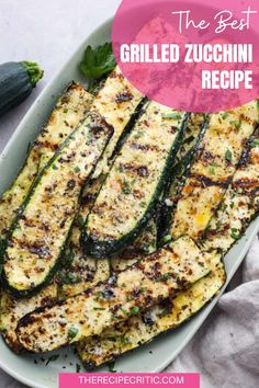 grilled zucchini on a plate with herbs