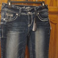 40 Inches Long, Wallflower Jeans, Size 7, Waist Is 15. Dark Blue With Rhinestones On Back Of Pockets. Excellent Condition, No Stains Or Holes. Smoke And Dog Free Home. Wallflower Jeans, Khaki Jeans, Maurices Jeans, Western Jeans, Curvy Jeans, Juniors Jeans, Boot Cut Denim, Maternity Jeans, Miss Me Jeans