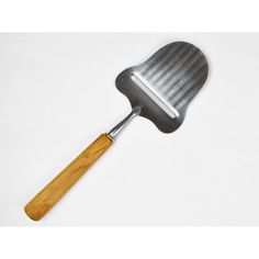 a spatula with a wooden handle on a white background